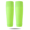 A pair of neon lime green compression sleeves for soccer and sports.