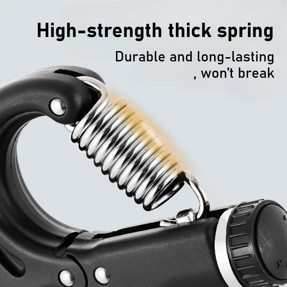 Close-up of a high-strength thick spring inside a black hand grip strengthener device.