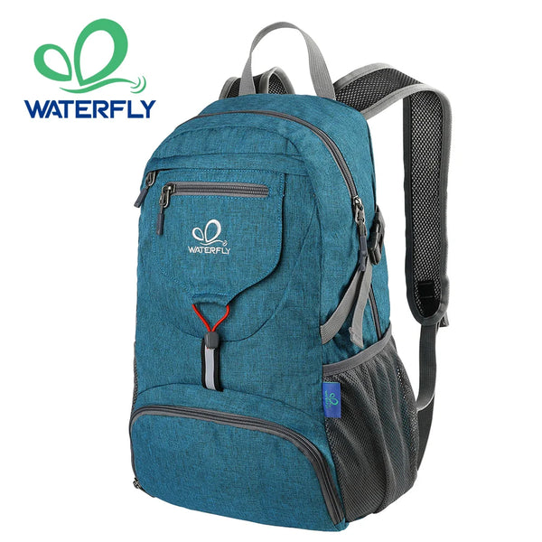 A teal waterproof backpack with gray straps and pockets shown from the front.