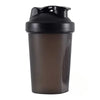 A black portable protein shaker bottle with a screw-on cap.