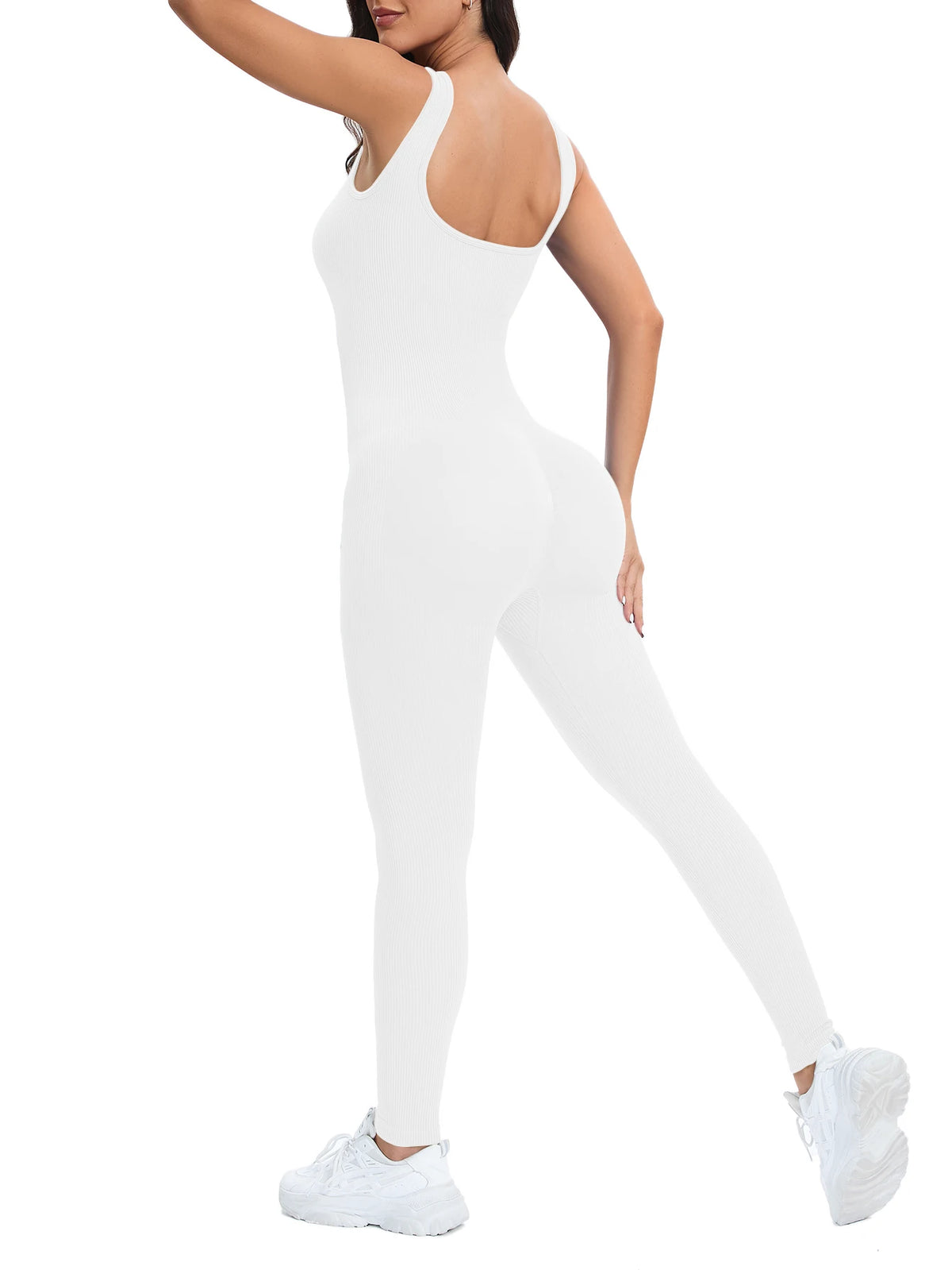 A model wearing a white ribbed nylon bodycon jumpsuit with a sleeveless design.
