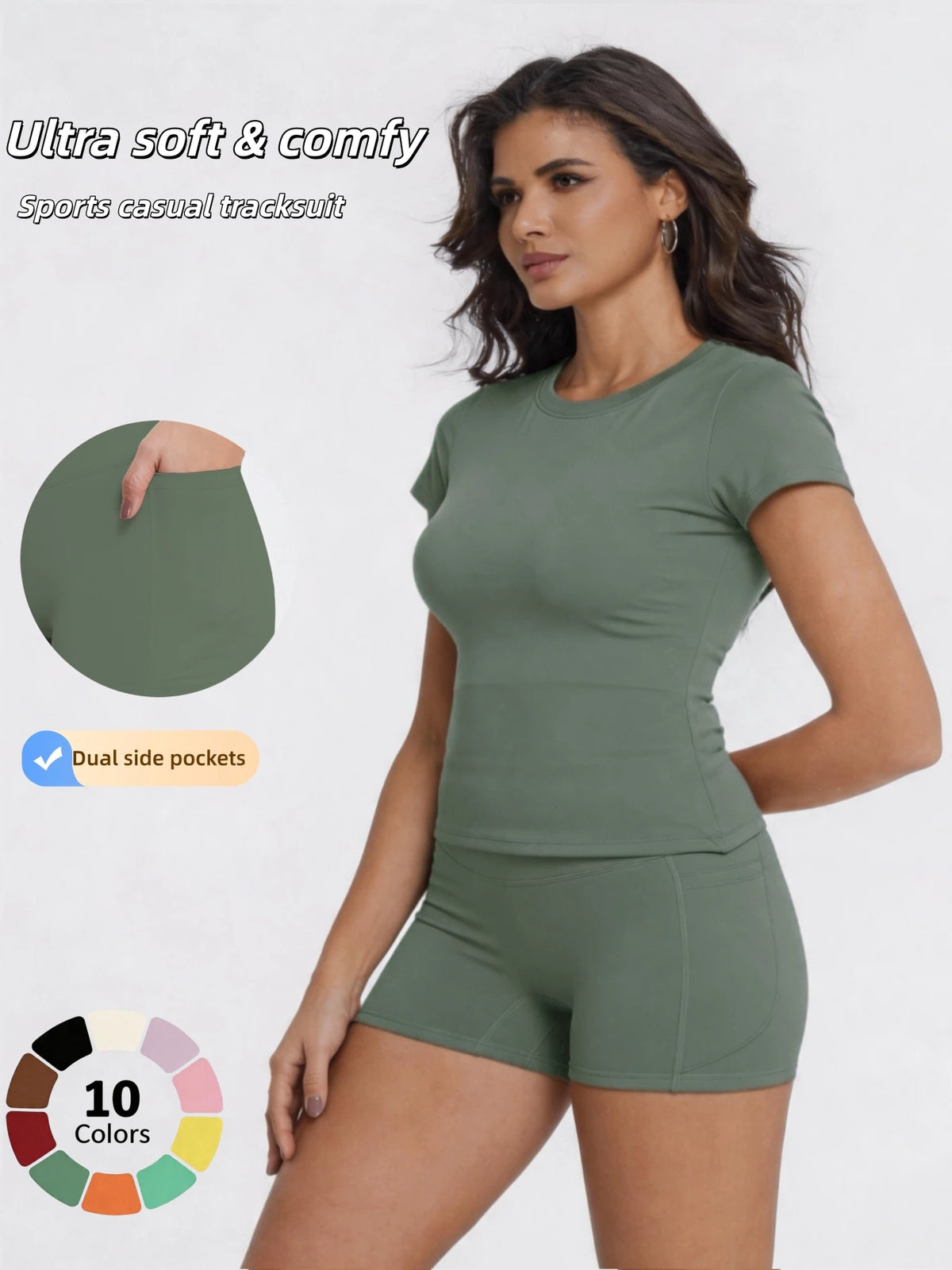 A woman models a olive green sports casual tracksuit top and shorts, highlighting dual side pockets.