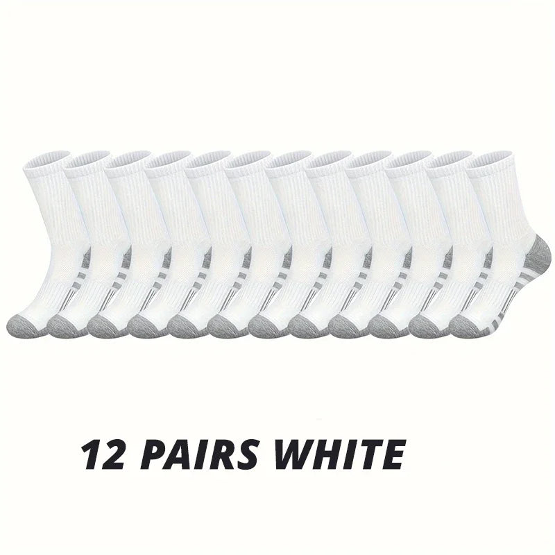 Twelve pairs of white men's outdoor gym football socks laid out in a row.