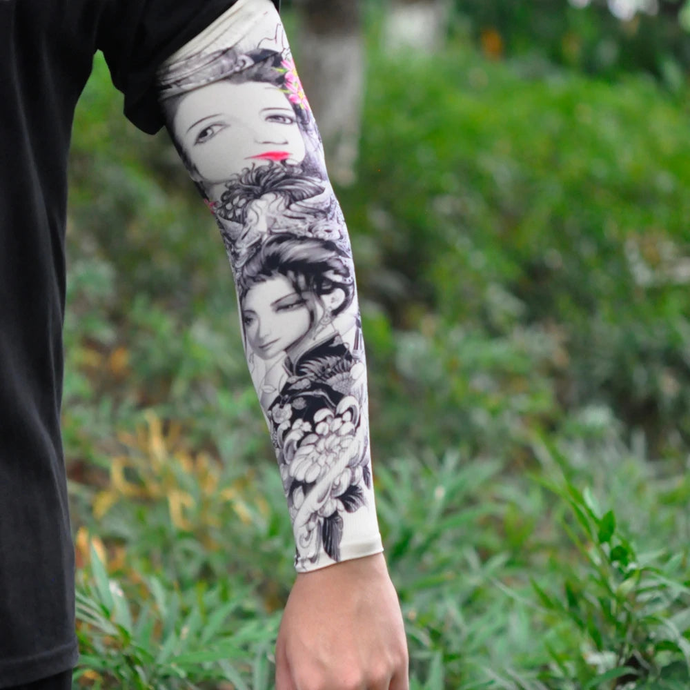 Close-up of a person wearing an ice silk tattoo sleeve on their arm, featuring a portrait design.