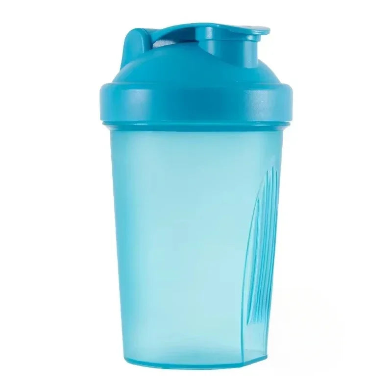 A clear blue portable protein shaker bottle with a hinged cap.