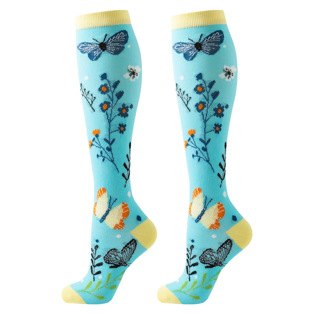 Pair of knee-high butterfly compression socks in blue with floral and butterfly patterns.