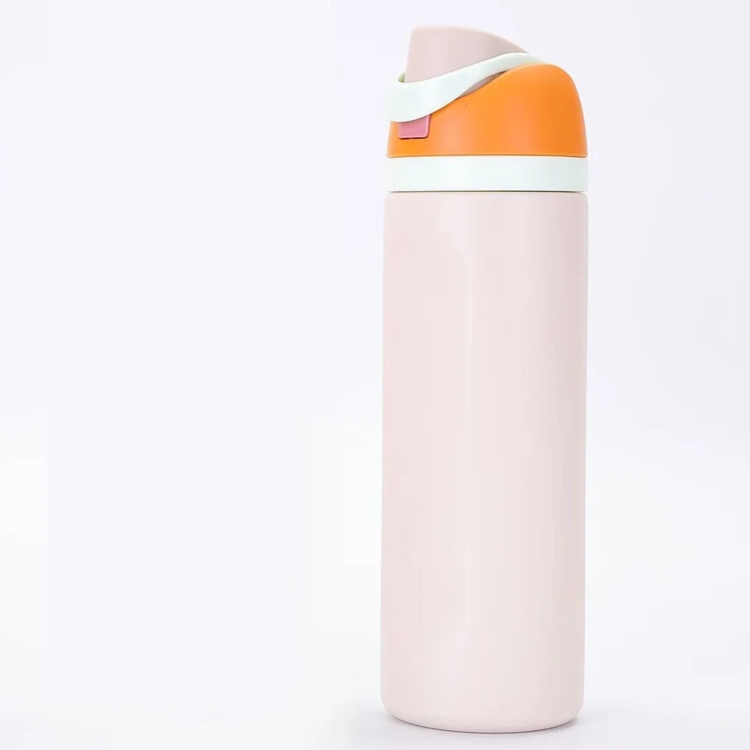 A pink insulated stainless steel thermos mug with an orange and white lid.