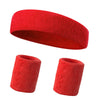 A set of three bright red knitted sports headbands for fitness and activity