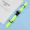 A bright neon yellow adjustable tactical backpack strap harness lying on a white paper with text.