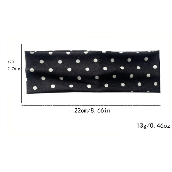 Black polka dot fabric hairband measuring 7cm long