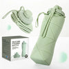 A light green silicone folding bottle shown with its disassembled components and a fully folded version.