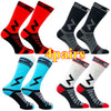 Four pairs of high-quality compression cycling socks in red, black, and blue designs.