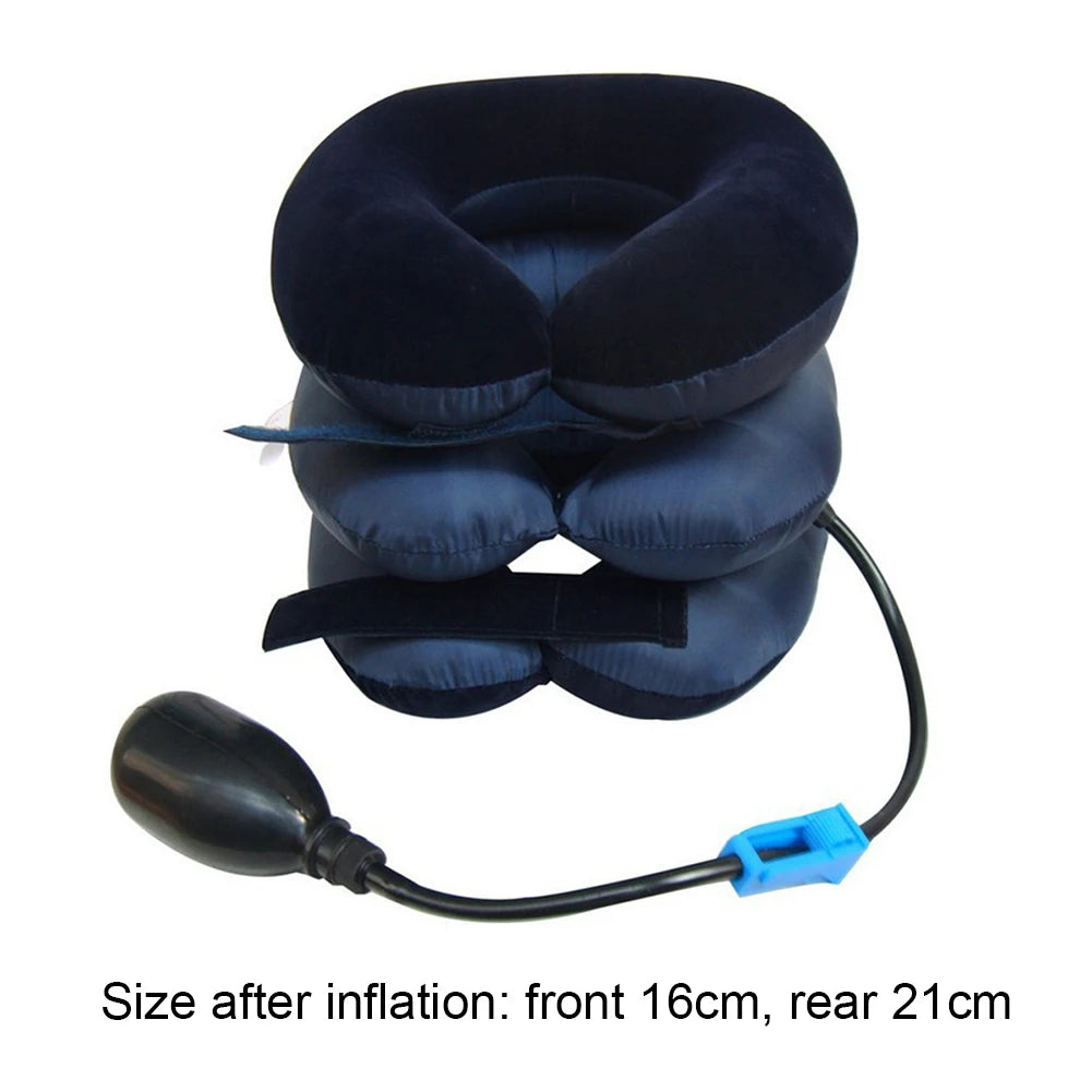 A dark blue inflatable cervical traction stretcher with a black hose and blue connector.