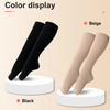 Two pairs of medical grade knee high compression stockings in beige and black displayed on a light background.