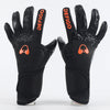 A pair of black professional football goalkeeper gloves with orange Defigo branding.