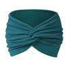 A teal stretch sport headband tied in a knot, shown from the side.