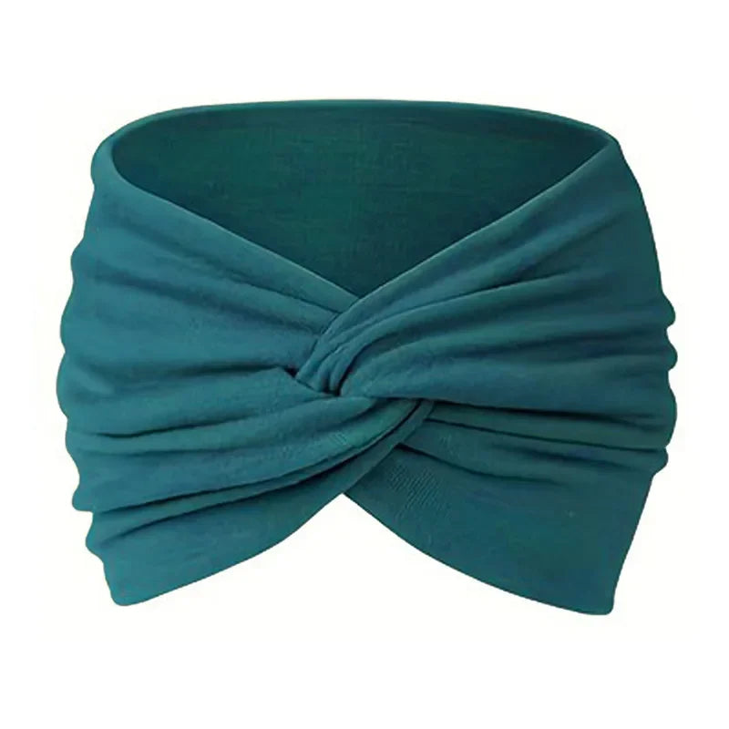 A teal stretch sport headband tied in a knot, shown from the side.