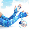 Blue milk silk half finger gloves worn on hands against a bright, sunny background.